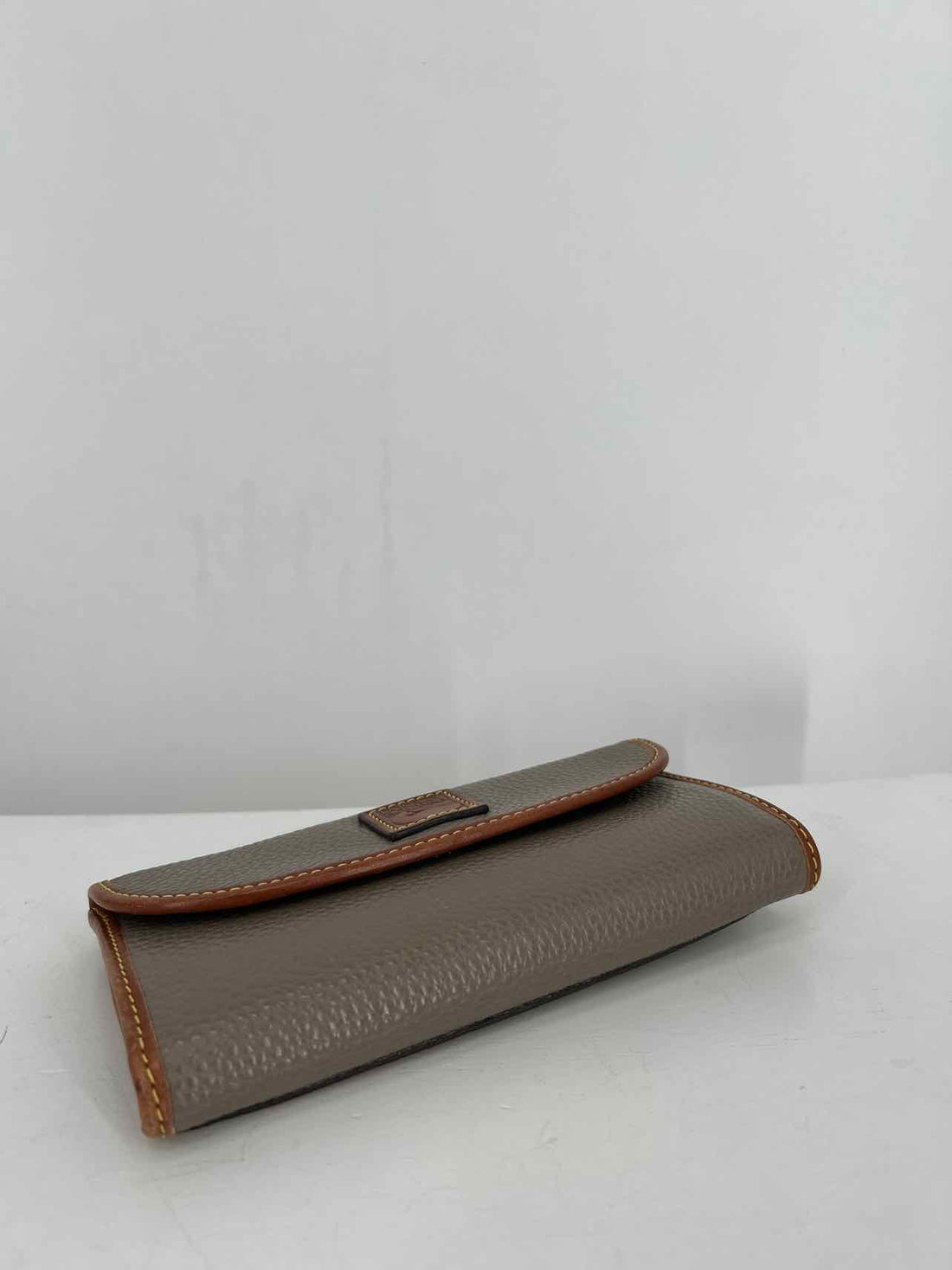 Dooney & Bourke Grey Pebbled Leather Trifold Wallet