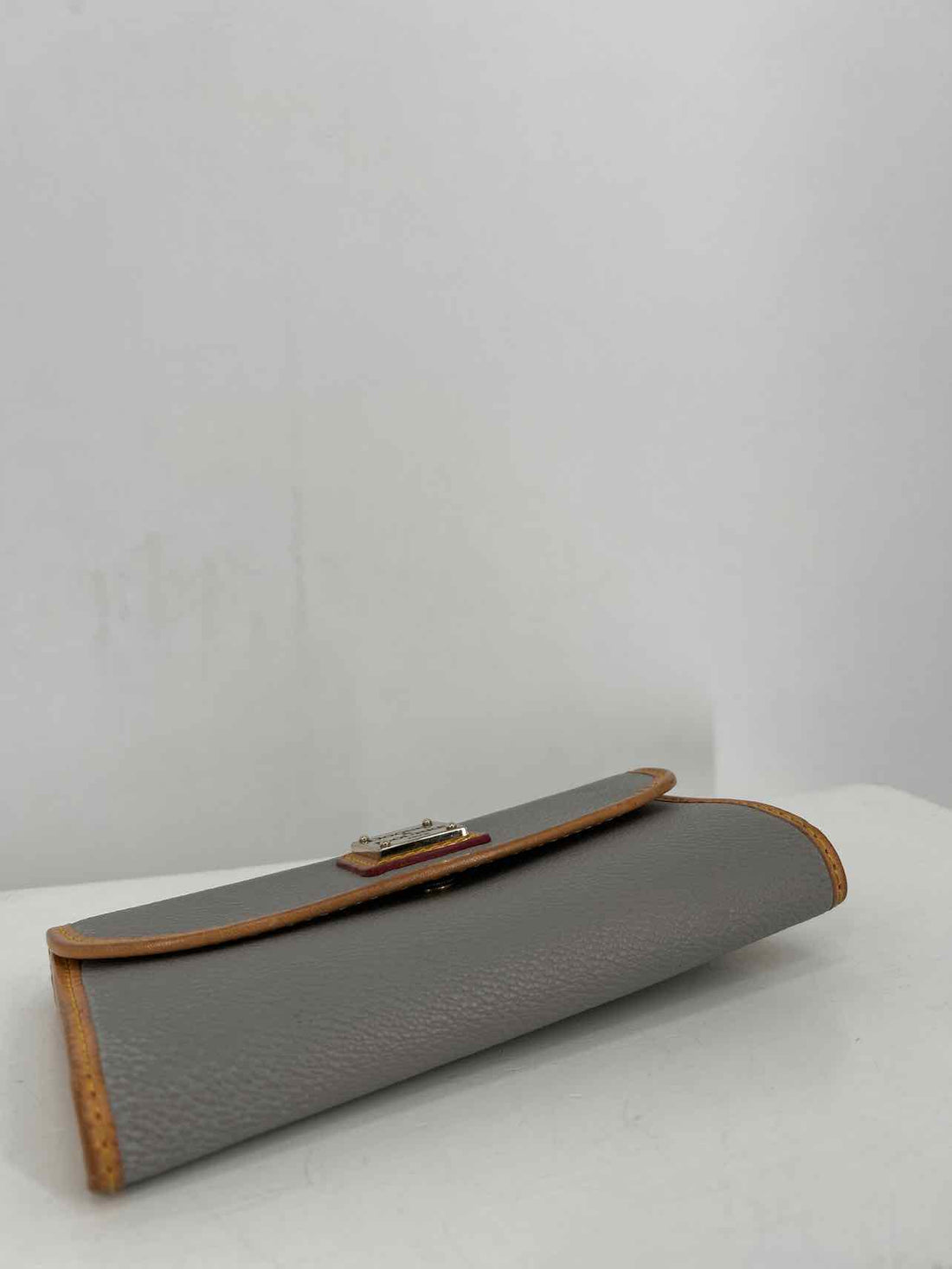 Dooney & Bourke Grey Pebbled Leather Trifold Wallet