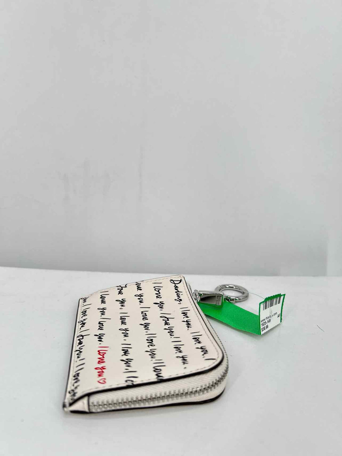 Kate Spade Cream Pebbled Leather Card Holder
