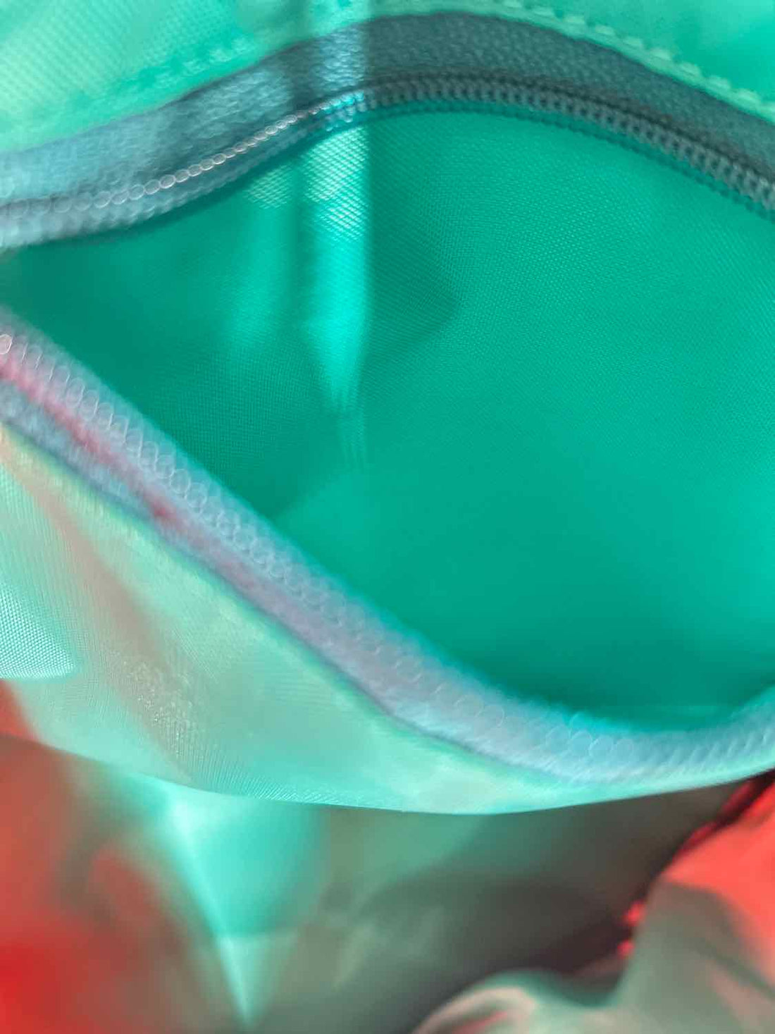 Kavu Orange & Teal Sling Backpack