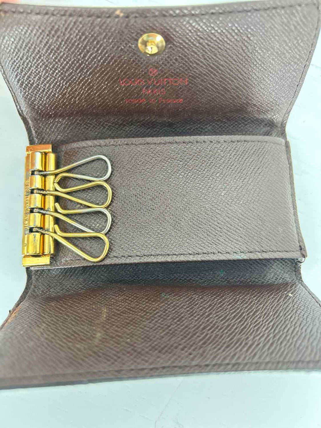 Louis Vuitton Damier Ebene 4 Key Holder Coated Canvas Misc.