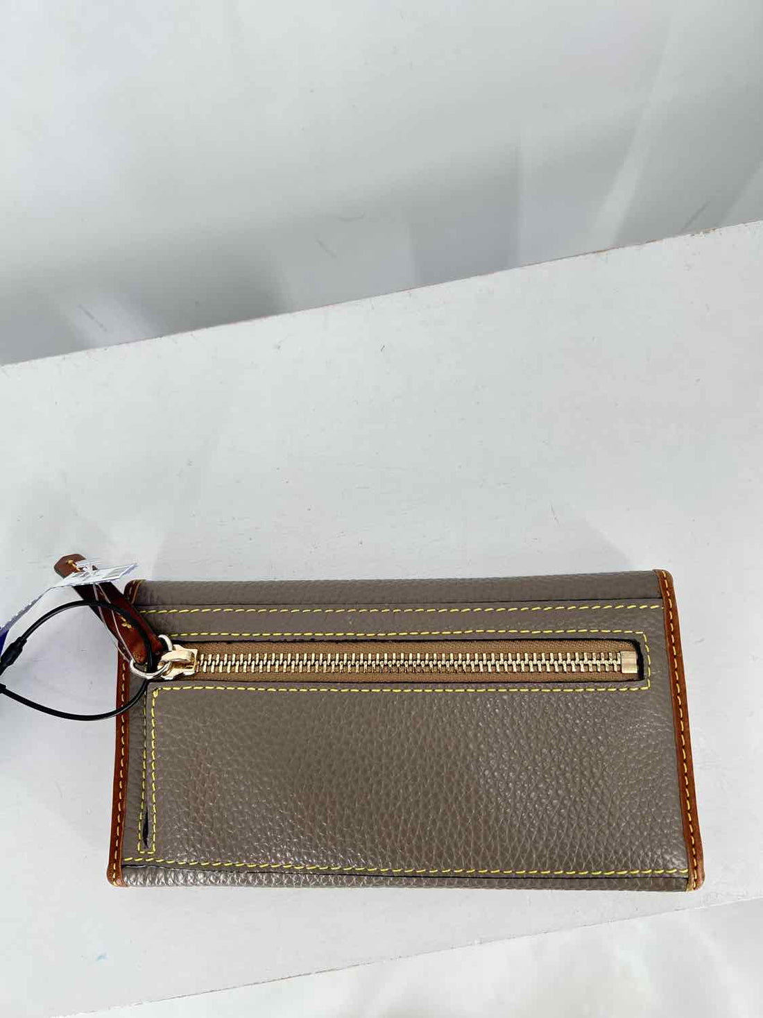 Dooney & Bourke Taupe Pebbled Leather Wallet